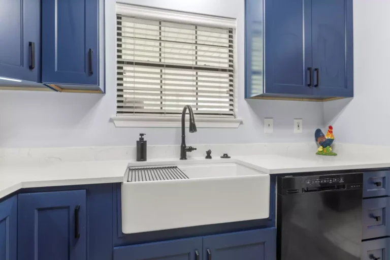 kitchen with blue cabinets and farmhouse sink