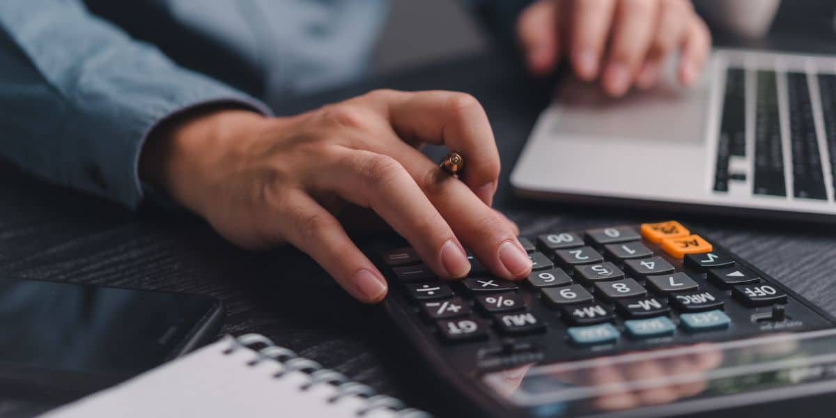 man calculating a budget